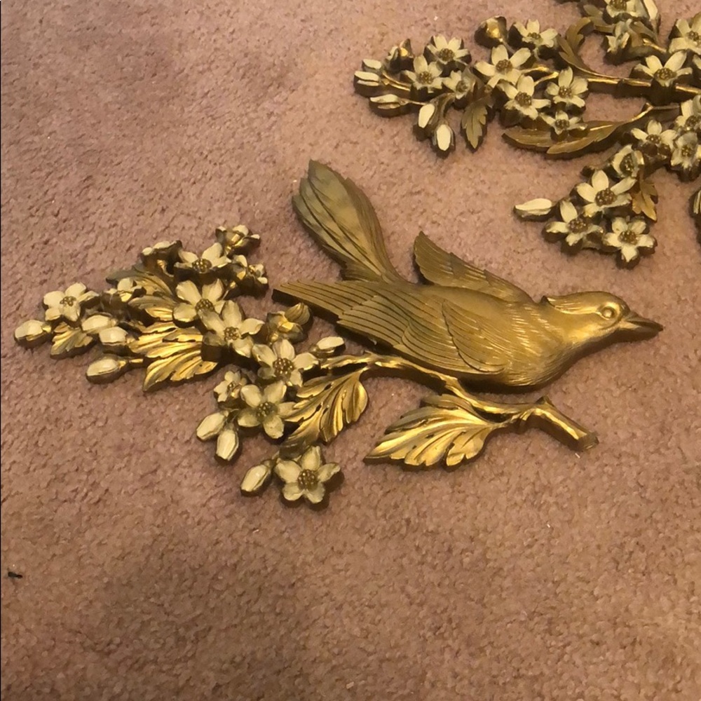 Metal bird and tree
